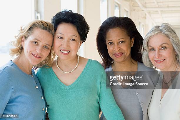happy women - four people stock pictures, royalty-free photos & images