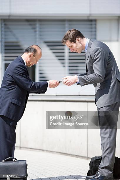 businessmen greeting - japanese respect stock pictures, royalty-free photos & images