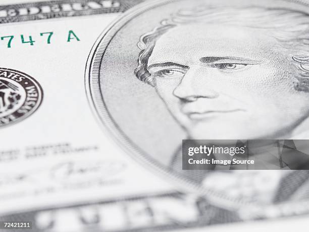 close up of a ten dollar note - alexander hamilton stock pictures, royalty-free photos & images