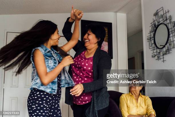 Mother and daughter dancing