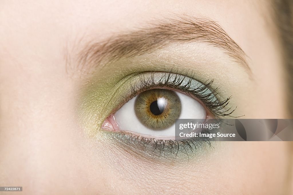 A woman wearing eye shadow