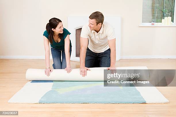 Roll Out Rug 85 Woman Rolling Out Rug Stock Photos, High-Res Pictures, and Images ...