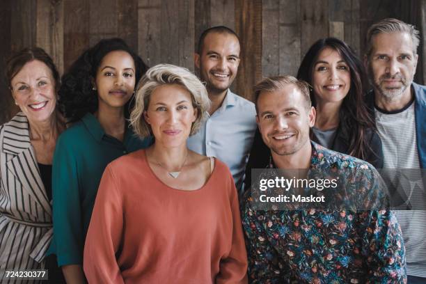 portrait of confident multi-ethnic business people in portable office truck - menselijke leeftijd stockfoto's en -beelden