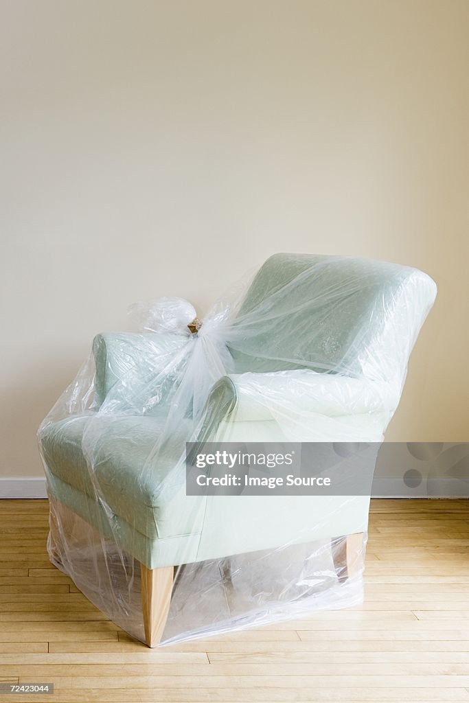 Arm chair protected by plastic