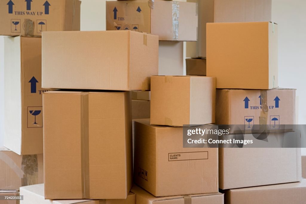 Stack Box Hardboard Stack Of Cardboard Boxes In A Room High-Res Stock Photo - Getty Images