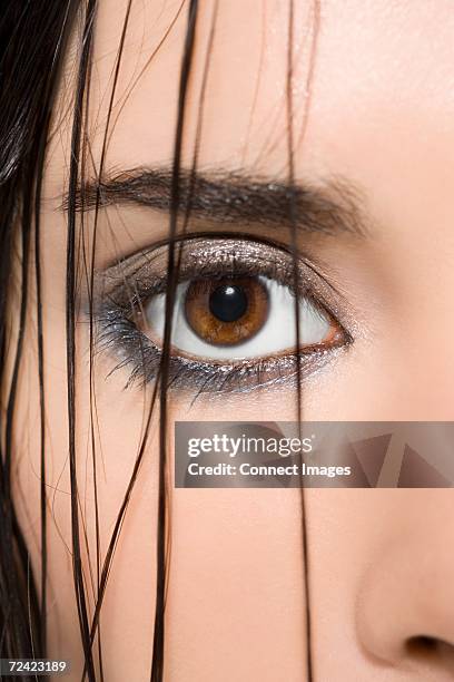 close up of woman's face - kajalschminke stock-fotos und bilder