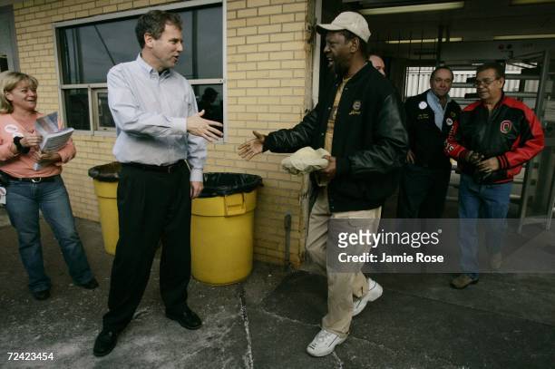 Ohio Democratic U.S. Senate candidate Sherrod Brown shakes hands with workers as they leave the the Ford Engine Plant November 6, 2006 in Brook Park,...