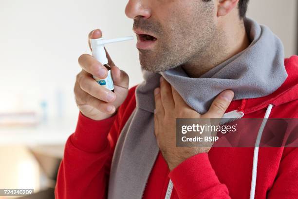 Using Mouth Spray 37 Man Mouth Spray Stock Photos, High-Res Pictures, and Images - Getty ...