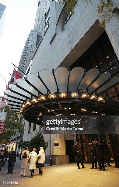 People walk by the Four Seasons Hotel on November 6, 2006 in New York City. The hotel chain has received a $3.7 billion buyout offer from a group...