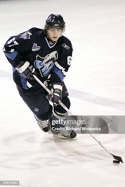 Michael Frolik of the Rimouski Oceanic skates with the puck during the game against the Gatineau Olympiques at the Robert Guertin Arena on November...