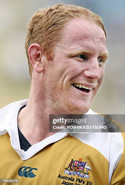 Australian Prime Minister's XV number 8 and captain John Roe smiles after they won a friendly match at the Prince Hitachi Memorial stadium in Tokyo...