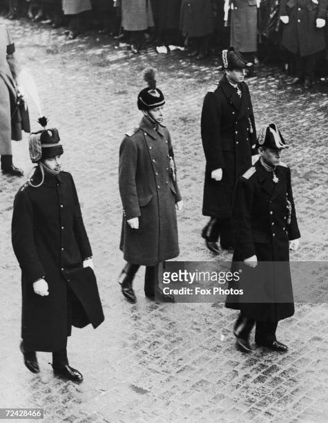 Prince George, Duke of Kent , George, Duke of York , Prince Henry, Duke of Gloucester and King Edward VIII in the procession at the funeral of their...