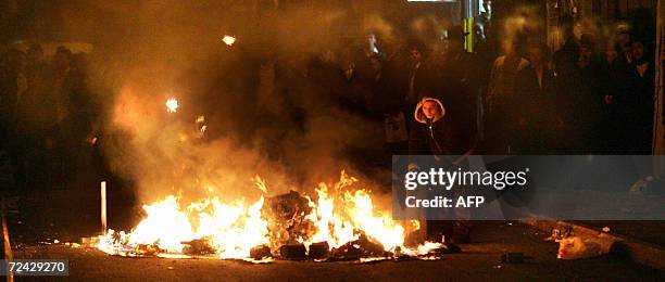 Ultra Orthodox Jewish demonstrator set up burning road blocks during a protest by hundreds against the up-coming gay pride parade in Jerusalem, early...