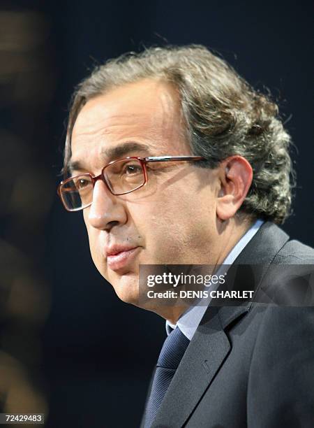 Fiat Chief Executive Sergio Marchionne talks during a press conference along with French car maker PSA Peugeot Citroen president and chief executive...