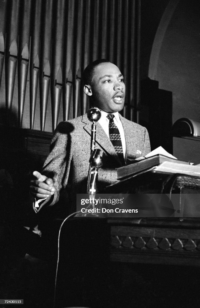Civil rights leader Martin Luther King Jr speaking at a ral