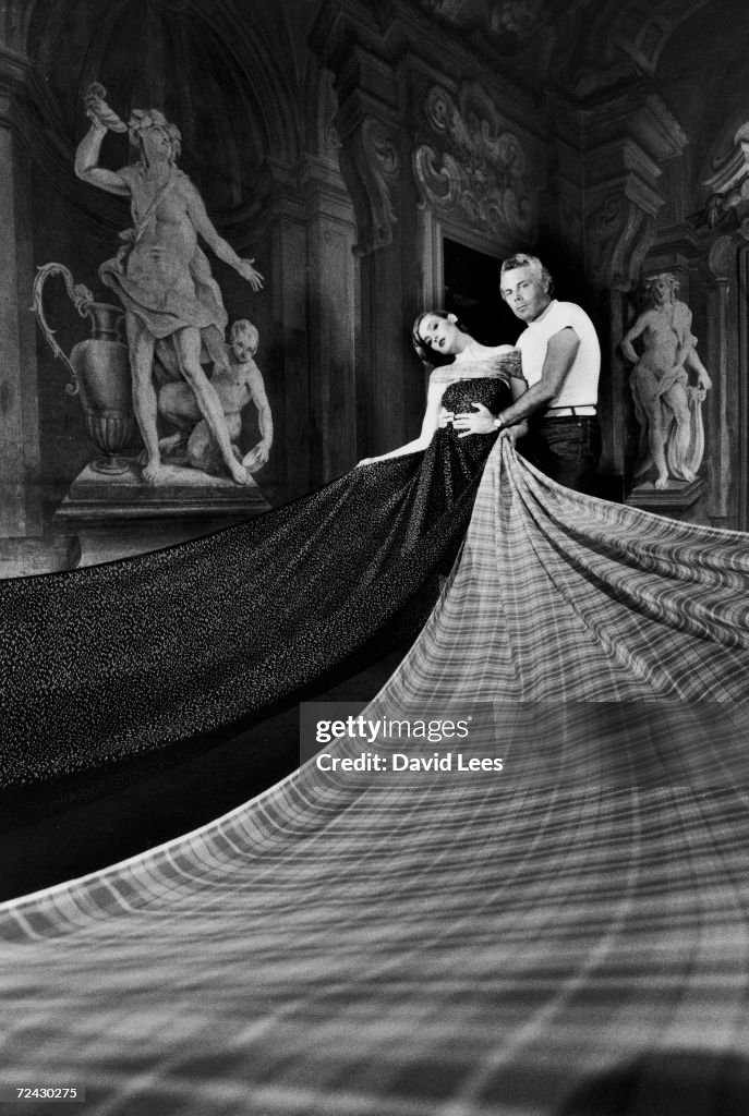 Fashion designer Giorgio Armani w unident model