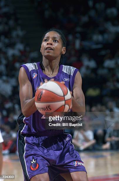 Kedra Holland-Corn of the Sacramento Monarchs prepares to shoot during the game against the Houston Comets at Compaq Center in Houston, Texas on June...
