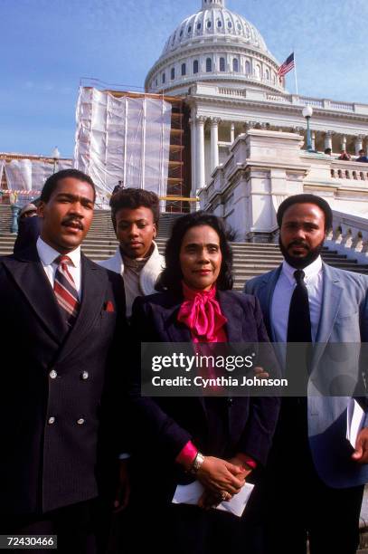 Coretta Scott King with her children Dexter, Bernice & Martin Luther III in Washington on the day her husband's birthday was declared a National...