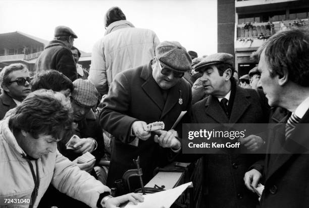 Bookmaker Sean Graham of Belfast takes a bet at Cheltenham National Hunt Challenge .