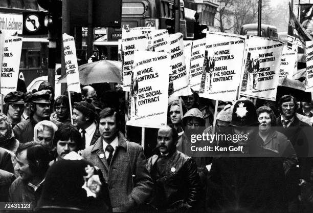 Trade unionists marching along Oxford street to the Houses of Parliament to lobby MP's for better wages.