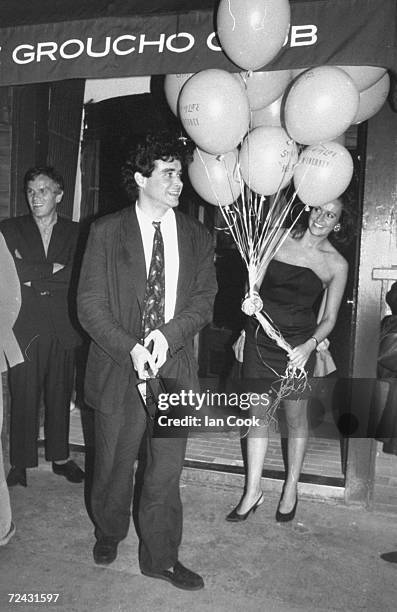 American novelist, Jay McInerney with publicist Caroline Michel at book party thrown for him at disco "Groucho's.".