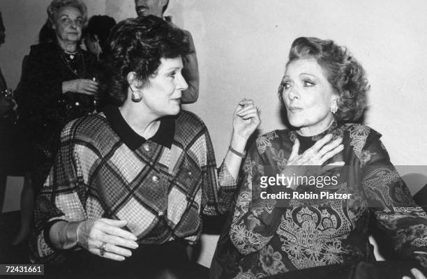 Actress Myrna Loy at tribute thrown for her with actress Joan Bennett.