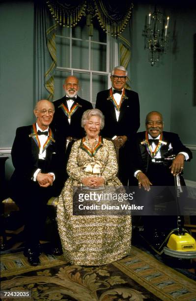 Kennedy Center Honorees Rudolf Serkin, Helen Hayes, Court Basie, Jerome Robbins & Cary Grant, all pose with their decorative medals given to them for...