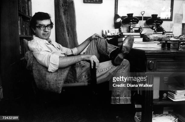 Portrait of American author Larry McMurtry as he sits in his bookstore, Booked Up, Georgetown, Washington DC, October 1978.