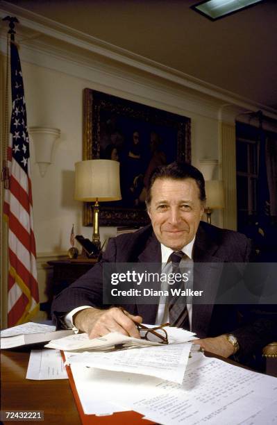 Secretary of Defense Caspar Weinberger in his office.