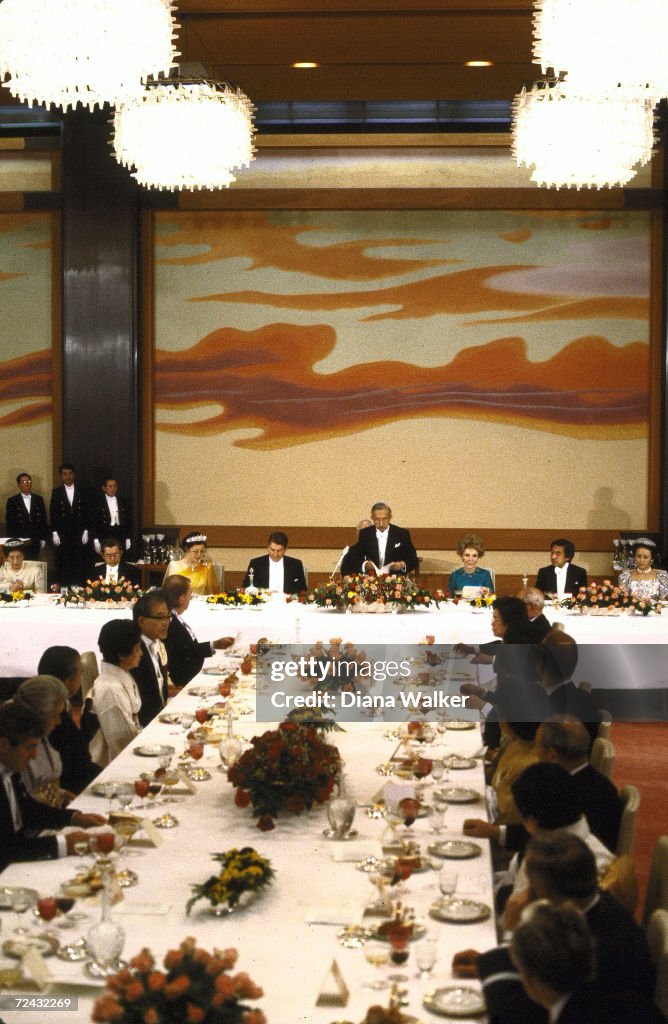 Japanese emperor Hirohito standing to address guests incl