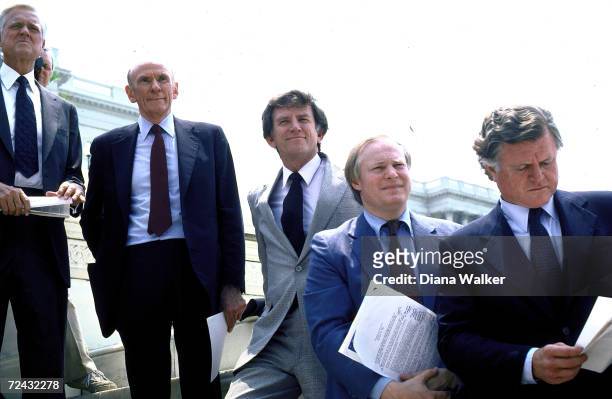 Senator Eernest Hollings, Alan Cranston, Gary Hart, james Leach and Ted Kennedy on the steps of Capitol Building during anti-war/anti-MX demo.