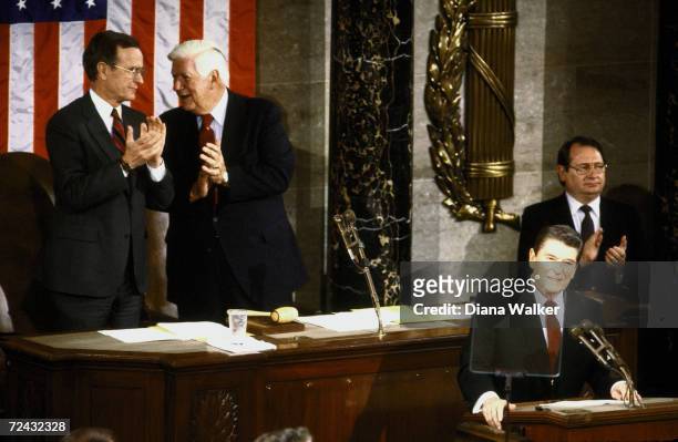 President Ronald Reagan, flanked by VP Bush, Rep. O'Neill & Assistant Senate Secretary Ridgely while addressing joint session of Congress on Central...