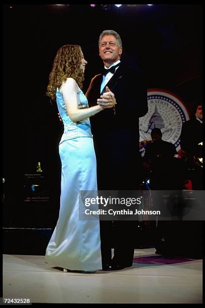 First daughter Chelsea Clinton dancing with dad President Bill Clinton, during Inaugural Arkansas Ball.