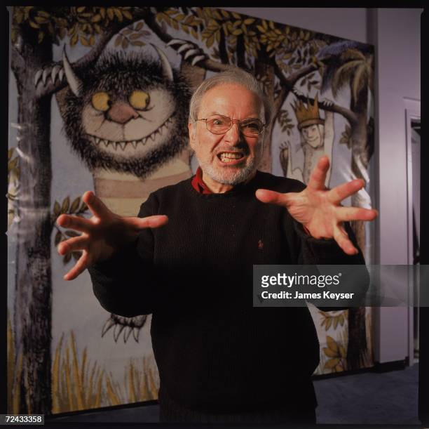Author/illustrator Maurice Sendak standing by an life-size scene from his book WHERE THE WILD THINGS ARE at the Children's Museum of Manhattan which...