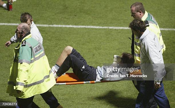 Tim Krul is stretchered off after being injured during warm up for the Carling Cup fourth round match between Watford and Newcastle United at...