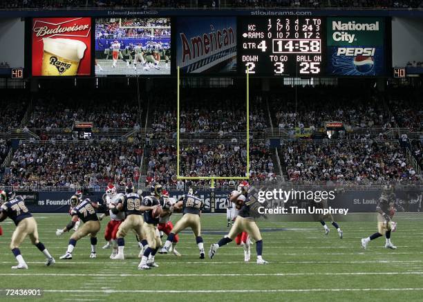 The St. Louis Rams offense blocks against the Kansas City Chiefs defense with the scoreboard in the background on November 5, 2006 at the Edward...