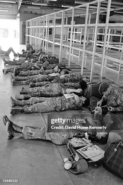 Marines wait for their plane to arrive at an airbase in 1973 in Bien Hoa, Vietnam. This group of Marines were among the last to leave Vietnam.