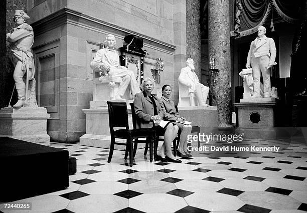 The only two female Justices of the U.S. Supreme Court, Sandra Day O'Connor and Ruth Bader Ginsburg, pose for a portrait in Statuary Hall March 28,...
