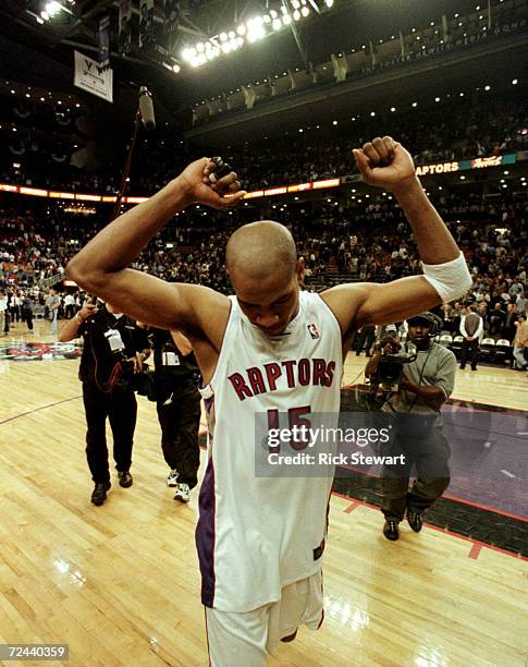 Vince Carter of the Toronto Raptors dejectedly acknowledges the crowd after the Raptors were beaten by the New York Knicks in Game 3 of the NBA First...