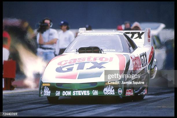 John Force performs during the NHRA Winternationals held at Pomona Dragway in California. Mandatory Credit: Jamie Squire /Allsport