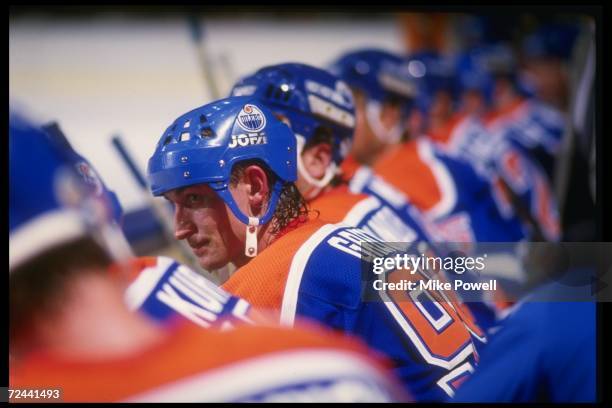 Center Wayne Gretzky of the Edmonton Oilers looks on during an NHL game against the Los Angeles Kings circa 1987 at the Great Western Forum in...