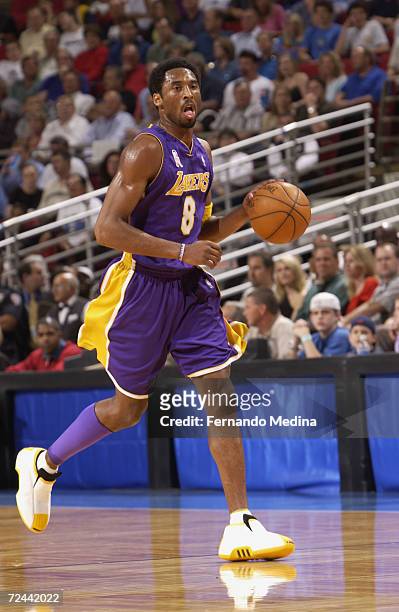 Guard Kobe Bryant of the Los Angeles Lakers dribbles the ball during the NBA game against the Orlando Magic at the TD Waterhouse Centre in Orlando,...