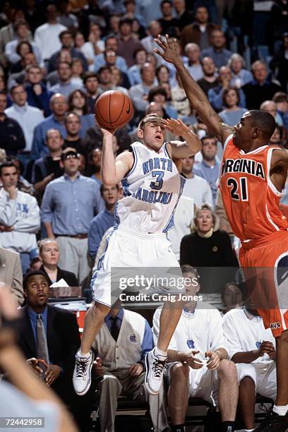 Brian Morrison of the North Carolina Tar Heels jumps with the ball during the ACC Conference basketball game against the Virginia Cavaliers at the...