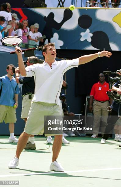 Vocalist Nick Lachey of 98 degrees plays a charity match at the Arthur Ashe Kid's Day Family and Music Festival August 26, 2000 at the USTA National...