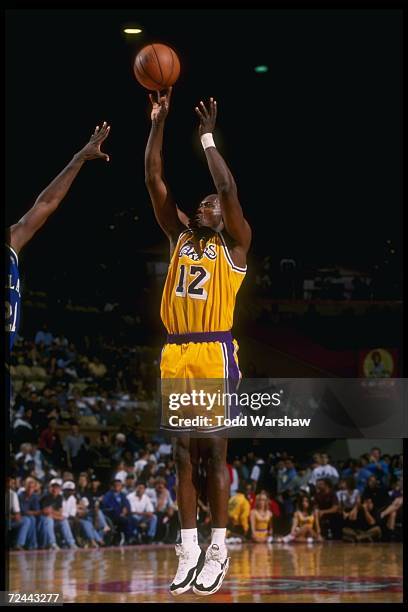 Forward Jerome Kersey of the Los Angeles Lakers goes up for two during a game against the Dallas Mavericks at Selland Arena in Fresno, California....