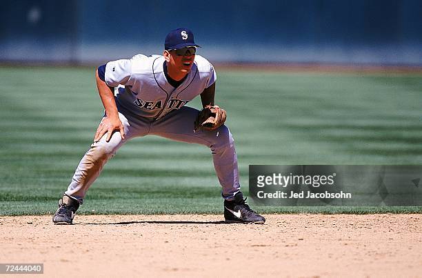 Alex Rodriguez of the Seattle Mariners stands ready to move during the game against the Oakland Athletics at the Network Coliseum in Oakland,...