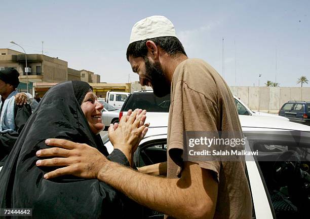 An Iraqi prisoner hugs his mother after being released from Abu Ghraib prison on May 14, 2004 in Ba'qoubah, Iraq. The U.S. Army released more than...