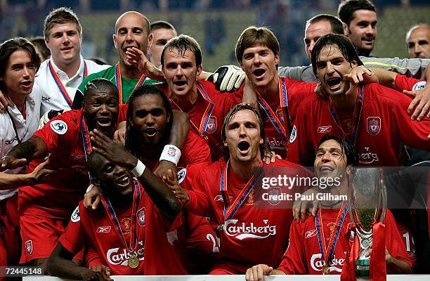 Liverpool players celebrate after winning the UEFA Super Cup match between Liverpool and CSKA Moscow at the Stade Louis II on August 26, 2005 in...