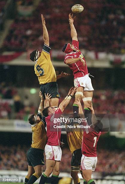 John Eales of Australia and Danny Grewcock of British Lions go up for a lineout during the First Test Match played between the Australian Wallabies...