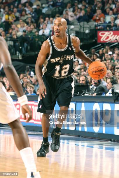 Bruce Bowen of the San Antonio Spurs drives against the Dallas Mavericks during the game at American Airlines Center on November 2, 2006 in Dallas,...